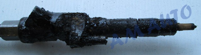Removed injector
                      flooded with black glop from axhaust gasses